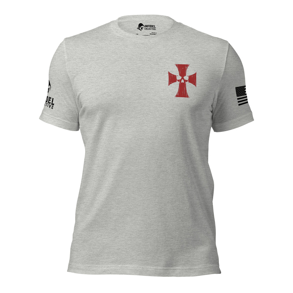 A light heather gray short-sleeve t-shirt with a red Maltese cross on the left chest, a black distressed American flag on the right sleeve, and black text on the left sleeve, shown on a plain white background.