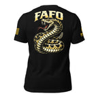 Black short-sleeve t-shirt shown from the back, featuring a large graphic of a coiled rattlesnake in yellow, beige, and black, with the text 'FAFO' in yellow above it. There are additional yellow graphic elements on both sleeves.
