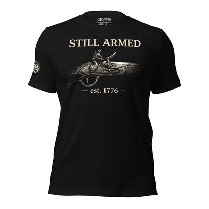 Black t-shirt with 'Still Armed' graphic and text on a white background