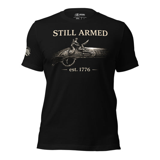 Black t-shirt with 'Still Armed' graphic and text on a white background