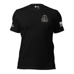 A black short-sleeve t-shirt with a gray cobra logo with INFIDEL on the left chest and a white American flag graphic on the left sleeve, with the brand logo on the left sleeve INFIDEL COLLECTIVE, shown on a plain white background.