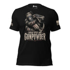 A front view of black short-sleeve t-shirt with a graphic print of a coiled snake holding a revolver and a star-patterned mug, with the text 'SUGAR SPICE AND GUNPOWDER' on the front. The brand name 'INFIDEL COLLECTIVE' is visible on the right sleeve with USA American flag on the right sleeve against a white background.
