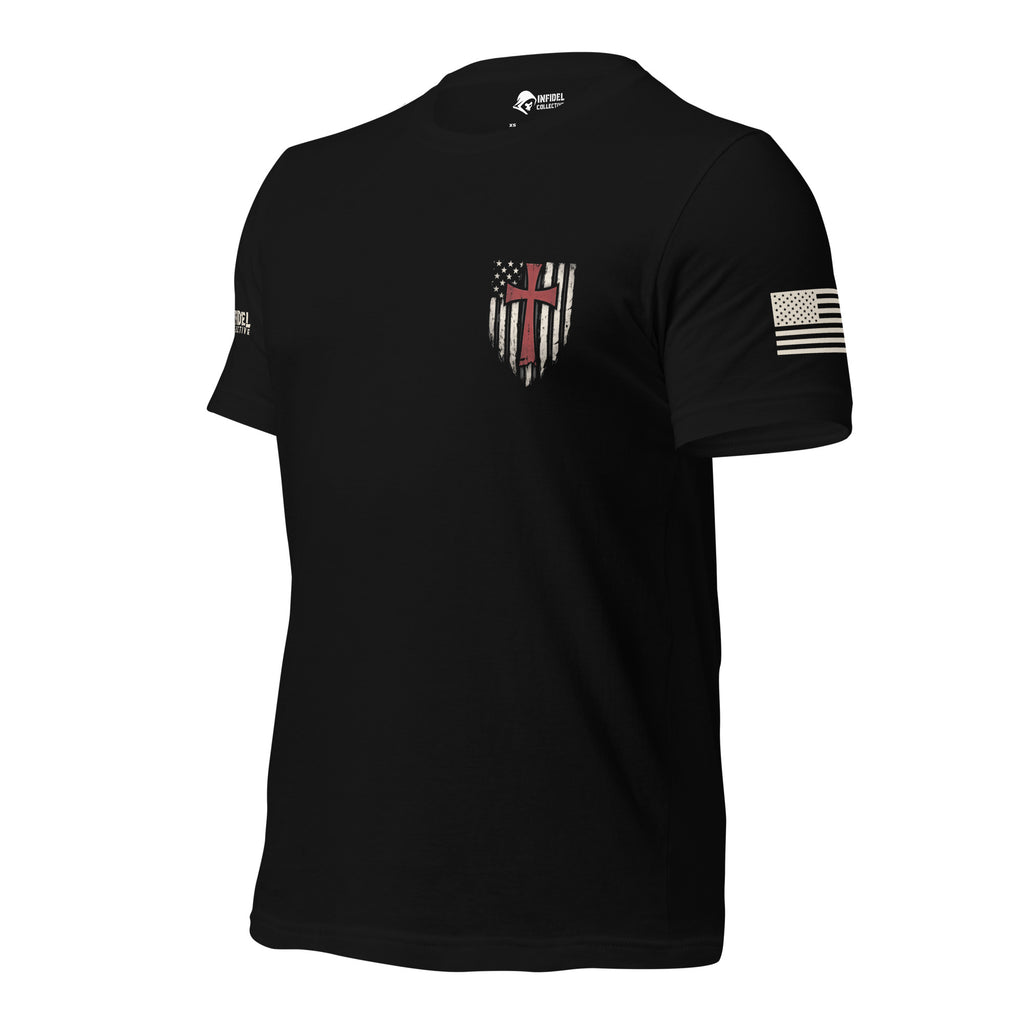 Left-front angled view of black Crimson Cross tee with small flag shield chest print