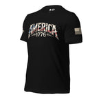 Left-front angled view of black America 1776 flag lettering tee