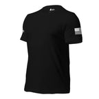 Left-front angled view of black blank-chest tee showing white sleeve graphics