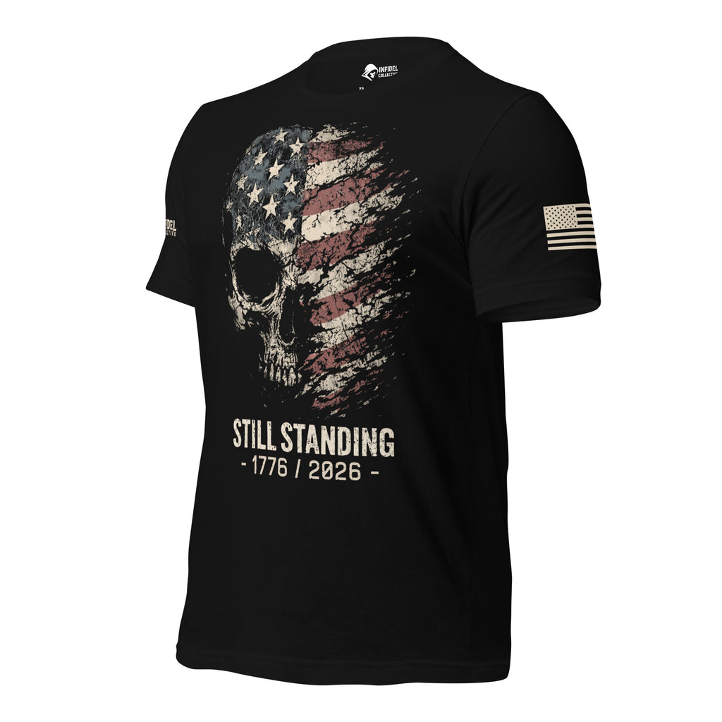 Left-front view of black tee featuring the Still Standing 1776 American flag skull graphic