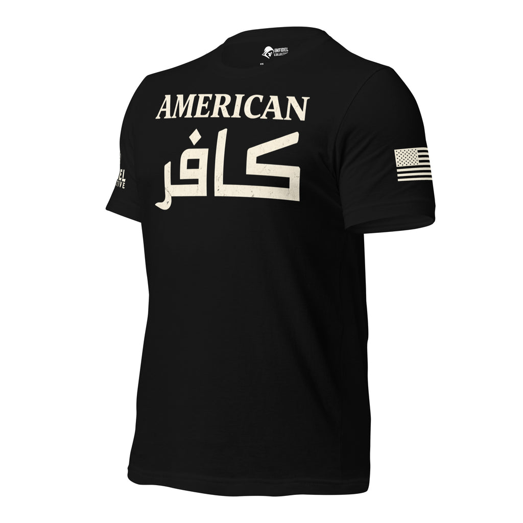 A black short-sleeve t-shirt with 'AMERICAN' printed in distressed beige text above large Arabic script calligraphy KAFIR, with a USA flag on the left sleeve and brand logo INFIDEL COLLECTIVE on the right sleeve, shown on a plain white background.