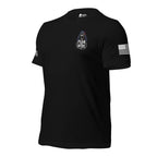 Black t-shirt with a reaper and "FEAR THE INFIDEL' TEXT integrated into the graphic at the front left chest pocket area, and sleeve patch of the brand "INFIDEL COLLECTIVE" on one sleeve and the USA flag on the other, on a white background