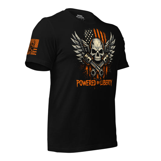 Ghosted mockup of Black t-shirt with a skull and crossed pistons design featuring an American flag, text 'Powered by Liberty', on a white background - side view.