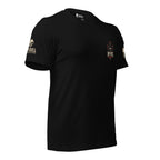 Black short-sleeve t-shirt shown from the left front, featuring a small pocket sized graphic of a hooded grim reaper skull holding a sword, with a red cross motif and the word 'INFIDEL' and 'UNBROKEN' in stylized white and red lettering.  A USA American flag on the left sleeve and brand logo INFIDEL COLLECTIVE on the right sleeve. The shirt is photographed against a white background.